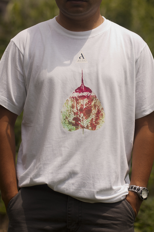 T-Shirt Gairimudi Artwork by: Shova Tapha- 13, Gairimudi-8 Available Colors- White, Black Available Size- S/M/L Price: RS. 800/- An artwork on the t-shirt is done by Shova Thapa from Gairimudi, Dolakha and the processed form the sale goes back to fund themselves.